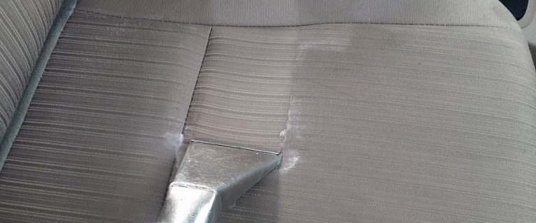 hoovering up excess water from upholstery